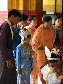 Image 7An ear-piercing ceremony at Mahamuni Buddha in Mandalay. (from Culture of Myanmar)