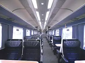 The interior of refurbished East Midlands Trains Mark 3 First Class with improved fluorescent lighting