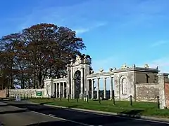 Easton Neston Gate – Main Entrance to Towcester Racecourse – surmounted by the Fermor arms, signed by William Croggon