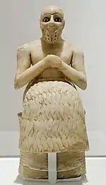 Statue of Ebih-Il, Mari on the Euphrates, made of gypsum alabaster (25th century BC)