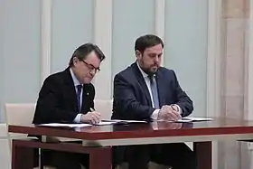 The President of the Generalitat of Catalonia Artur Mas and Oriol Junqueras, signing the 2012–2016 governability agreement on 19 December 2012.