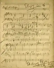 a page of musical score with Edward Elgar's signature at the bottom