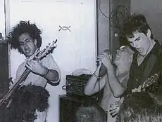 Embrace at Food for Thought on July 28, 1985. From left to right are Chris Bald, Ian MacKaye, and Mike Hampton. Band's drummer, Ivor Hanson, is out of frame.