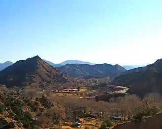 Similar view ca. 2008. NM Route 68 to Taos at right.