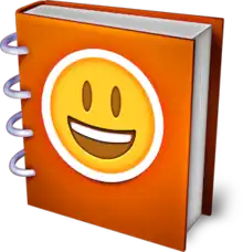 An orange book with a yellow smiley face on the cover