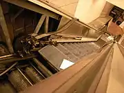 View of escalator steps on continuous chain