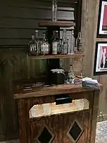 Bar in escape room themed as Ryan Reynolds 's office on distillery tour