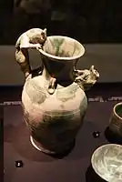A ewer with lugs, a dragon-head spout, and feline-shaped handle; From North China (perhaps Hebei)