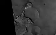 Exhumed Crater in Mare Acidalium, as seen by Mars Global Surveyor.