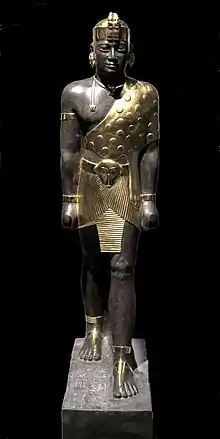 Senkamanisken statue, with Kushite headress (Louvre Museum, reconstruction through color-pigment analysis).