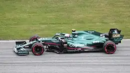 2021: Sebastian Vettel driving the Aston Martin AMR21 at the 2021 Austrian Grand Prix