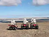 Crew 7 members on a motorized EVA.