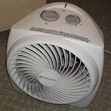 Portable fan heater, used to heat a room