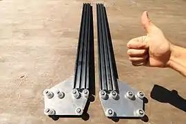 The gantry uses OpenBuilds V-Slot extrusions and wheels attached to connecting plates.