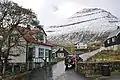 Slættaratindur seen from the streets of Funningur.