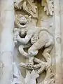 Detail of the facade of the New Cathedral of Salamanca: faun with ice cream. Added during renovations