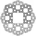 Construction by iterated collection of 8 square patterns around each square pattern.