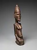 Figure of a kneeling woman; circa 1500; wood; height: 35.2&nbsp;cm (13.mw-parser-output .frac{white-space:nowrap}.mw-parser-output .frac .num,.mw-parser-output .frac .den{font-size:80%;line-height:0;vertical-align:super}.mw-parser-output .frac .den{vertical-align:sub}.mw-parser-output .sr-only{border:0;clip:rect(0,0,0,0);clip-path:polygon(0px 0px,0px 0px,0px 0px);height:1px;margin:-1px;overflow:hidden;padding:0;position:absolute;width:1px}7⁄8 in.); Metropolitan Museum of Art (New York City)
