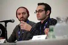 Photograph of Rafi and Benny fine sitting at a table