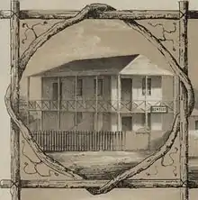 19th-century house with "dentist" sign