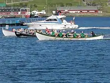 Image 12Kappróður is the Faroese word for rowing competition in wooden Faroese rowing boats. There are 7 regattas held around the islands every summer, where boats in different sizes compete. Here is the largest boat type 10-mannafør. (from Culture of the Faroe Islands)