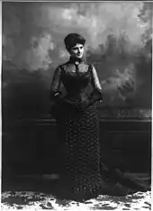 Frances Cleveland standing wearing a gown
