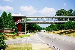 Pedestrian bridge over US 29; entrance to Emmanuel College on the left