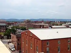 Downtown Frederick in June 2014 with the Blue Ridge Mountains in the distance