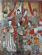 Women depicted in the Fresco in the Hall of King Mingying. Han women wore elbow-length sleeves, cross-collar upper garment over a long-sleeved blouse; the abbreviated skirts were popular in Yuan.