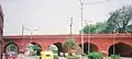 Arched bridge linking Salimgarh and Red Forts on former Yamuna River channel now closed and converted into the main thoroughfare