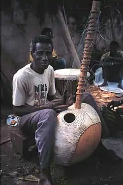 Image 4Master Kora maker Alieu Suso in the Gambia (from Origins of the blues)