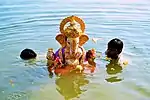 Ganesha idols being immersed (visarjan) on Ananta Chaturdashi.