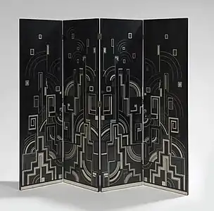 Screen by Gaston Suisse, Black Chinese lacquer and graphite inlays. Abstract geometric decor in silver lacquer.circa1925,,Exposition: 1925, Quand L'art Déco séduit le monde.Cité de l'architecture, Palais de Chaillot, Paris