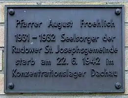 Commemorative plaque in memorial of August Froehlich, in front of St Josef's parish in Berlin-Rudow.
