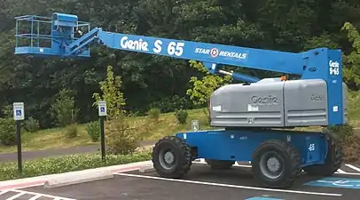 A Genie S-65 Boom lift on the Washington State University-Vancouver campus in Vancouver, Washington. Genie Industries is a subsidiary of Terex.