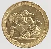 A gold coin showing as its central element a naked man on a horse attacking a dragon using a broken spear