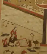 "Giảng học đồ" (Teaching), 18th century, Hanoi museum of National History. Scholars and students wear cross-collared gowns (áo giao lĩnh) - unlike the buttoned áo dài.