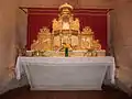 Gilt and polychrome wood altarpiece or retable in the church, made in the 17th century for the Carthusian monastery of Vauclair, Montpon