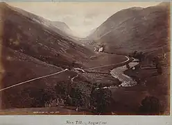Wilson's August 1885 photograph of the Glen Tilt looking upstream toward Forest Lodge.    Location: .mw-parser-output .geo-default,.mw-parser-output .geo-dms,.mw-parser-output .geo-dec{display:inline}.mw-parser-output .geo-nondefault,.mw-parser-output .geo-multi-punct{display:none}.mw-parser-output .longitude,.mw-parser-output .latitude{white-space:nowrap}56°49′29″N 3°47′38″W﻿ / ﻿56.82461°N 3.79392°W﻿ / 56.82461; -3.79392﻿ (Glen Tilt June 2019)