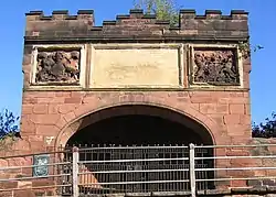 An 18th-century plaque on the Goblin Tower, marking the repairs to the city walls following heavy damage during the civil war.