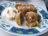 Holubtsi stuffed with buckwheat groats, served with smetana