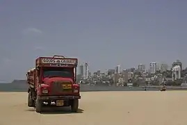 Decorated truck at a beach in Mumbai.