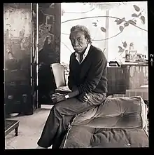 Gordon Parks next to his piano, late 1980s
