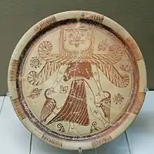 Winged goddess with a Gorgon's head, orientalizing plate, c.600 BC, from Kameiros, Rhodes