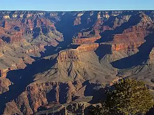 View to Sumner Butte, Redwall Limestone peak & vertical cliff, sitting on Muav Limestone