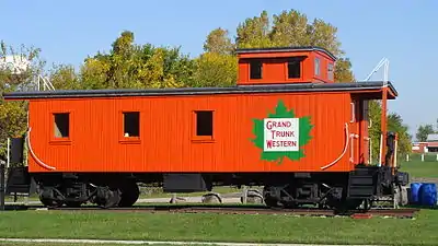 A restored GTW wood caboose on display at Lake Odessa, Michigan