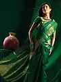 Photograph of a green brocade silk saree