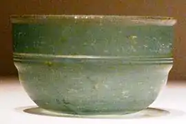 Green Roman glass cup unearthed from an Eastern Han dynasty (25–220 CE) tomb, Guangxi, southern China