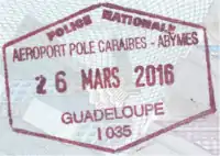 Exit stamp at Pointe-à-Pitre International Airport (Guadeloupe) in a Swedish passport