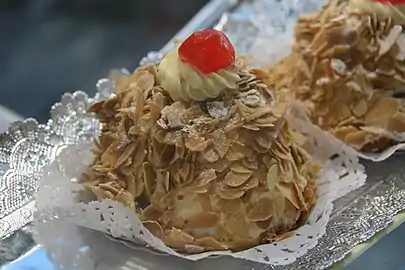 Almond cream cake covered in slivered almonds